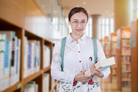 大学女生教学楼学习看书大学女生图书馆学习设计图片