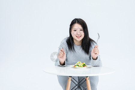 胖女生健康饮食背景图片