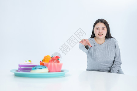 胖女生与甜食背景图片