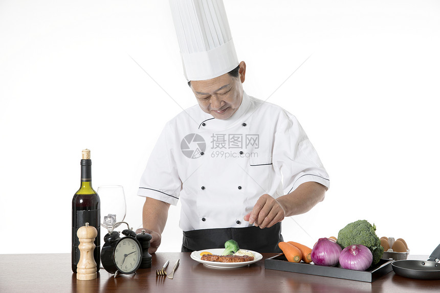 厨师烹饪牛排图片
