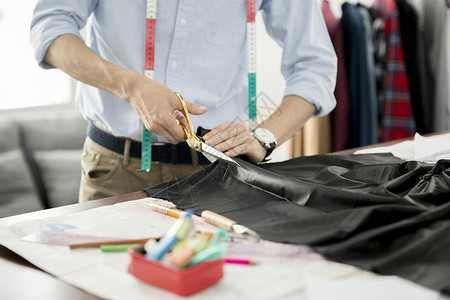 定制服装素材男服装设计师背景