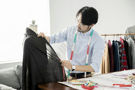 男服装设计师背景图片