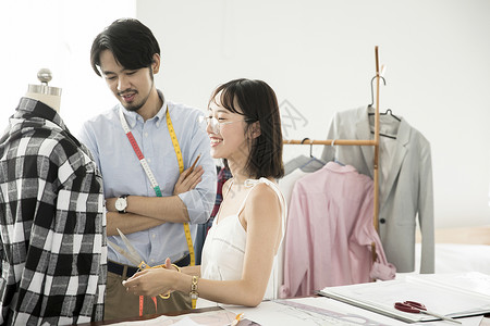 男女服装设计师背景图片