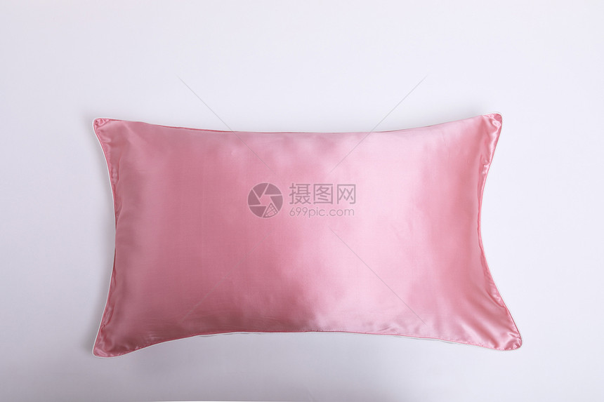 柔软的粉色枕头图片