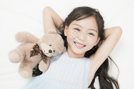 一个玩具熊儿童节小女孩背景