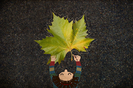 女孩画树叶设计图片