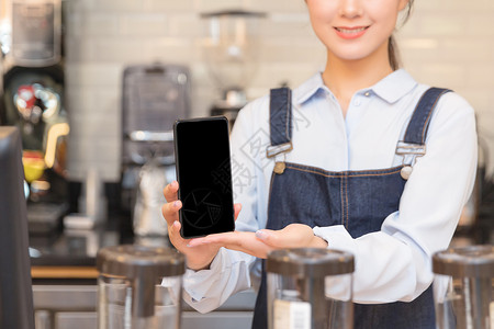 电商服务素材咖啡馆服务员手机支付特写背景