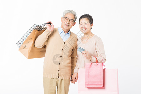 老年消费幸福的老年夫妻消费购物背景