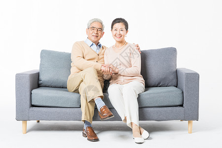 沙发上幸福的老年夫妻老人高清图片素材