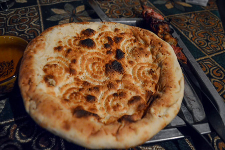 新疆是个好地方新疆特色小吃烤馕背景