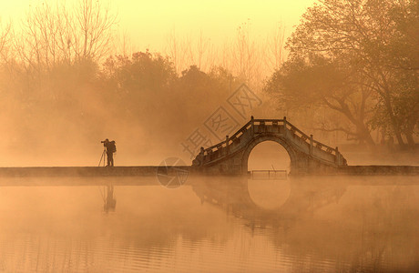 杭州断桥残雪黄昏的杭州西湖背景
