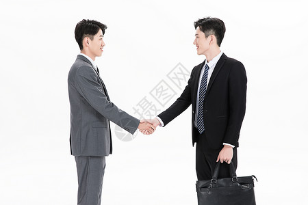 相互握手的男性白领背景图片