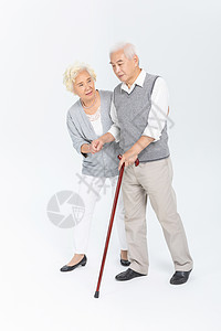 全程扶持老年夫妇拐杖搀扶背景