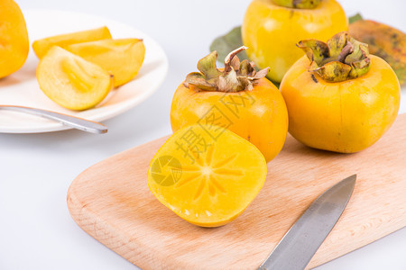 黄色的柿子秋季水果高清图片素材