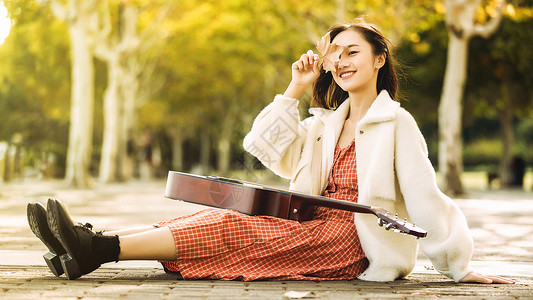 弹吉他的美女文艺清新美女弹吉他背景