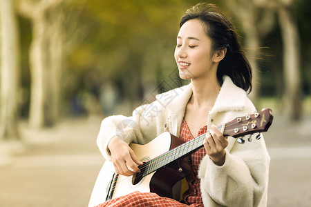 弹吉他女人文艺清新美女弹吉他背景