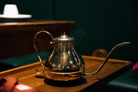 铜色怀表复古茶壶背景