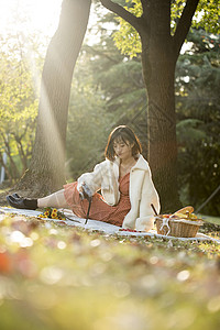 户外文艺少女野餐背景图片