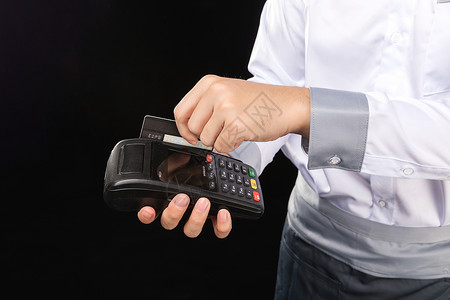 支付技术男服务员刷卡动作背景