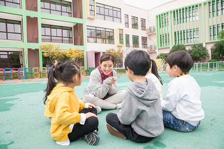 幼儿园老师教育儿童背景图片