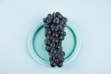 水果黑加仑蓝色盘子高清图片