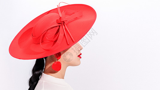 红色的帽子美女红色极简妆容背景