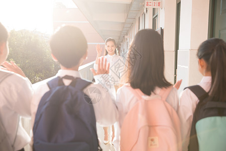 礼貌服务学生放学与老师道别背景