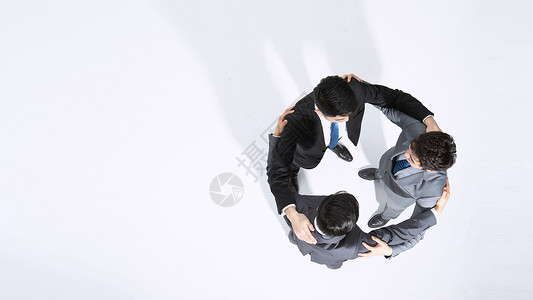 企业伙伴商务团队合作俯拍背景