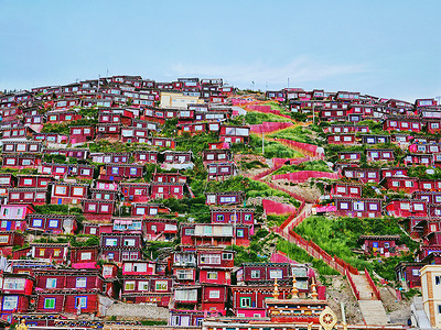 红房屋色达密集的红色房屋背景