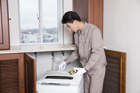 工人家电维修洗衣机家政服务高清图片素材