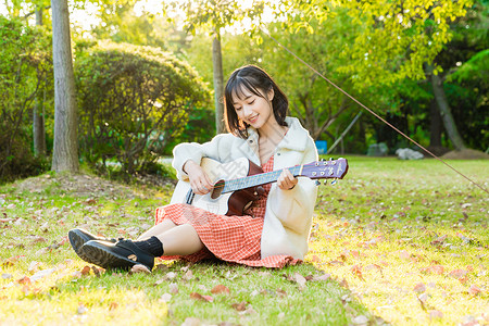 文艺女生弹吉他高清图片