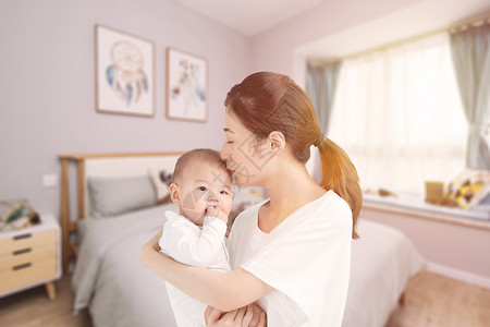 床上婴儿抱着孩子的妈妈设计图片