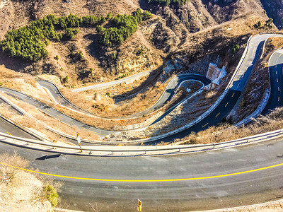 曲折的道路北京房山蜿蜒曲折的红井路弯道背景