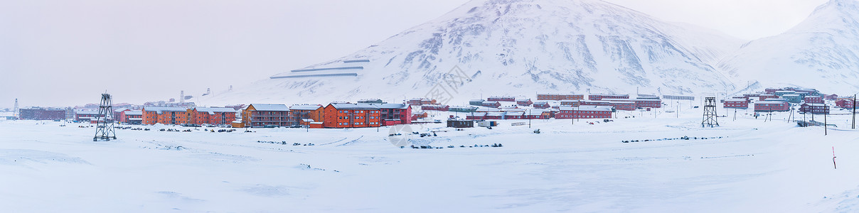 铝单板建筑北极城市朗伊尔城冬季城市雪景背景