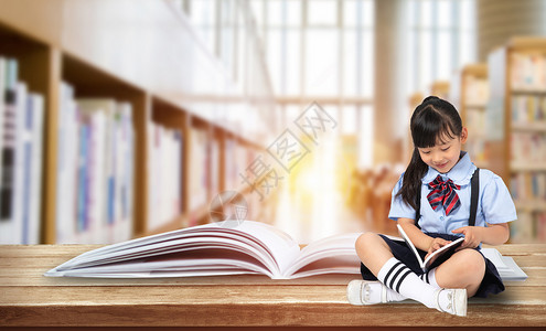 茶杯里小女孩沉浸在学习里的孩子设计图片