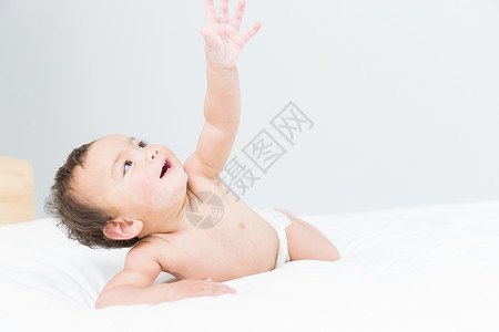 婴儿伸手背景图片