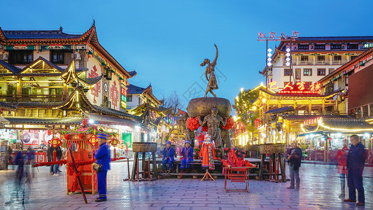 土家酱香饼恩施土家女儿城夜景背景