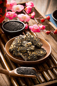 中式传统小吃黑芝麻花生糖背景图片