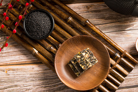 糖花生中式传统小吃黑芝麻花生糖背景