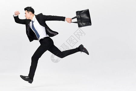 商务男性奔跑背景图片