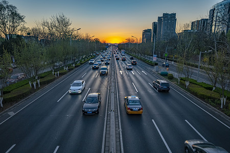 北京城市堵车晚霞北京德胜门桥二环路背景