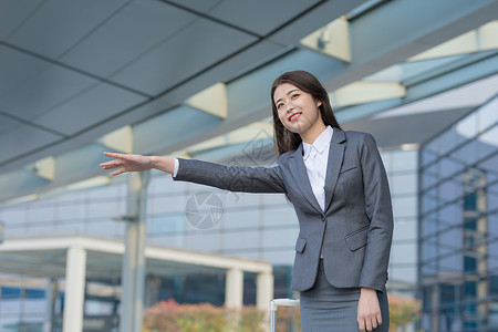 商务女性机场打车叫车高清图片素材