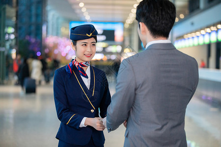 机场空姐服务空姐和乘客背景