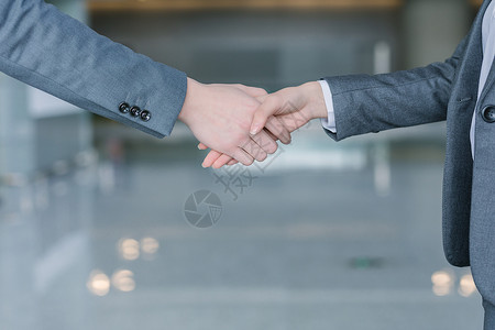 商务见面商务人士握手背景
