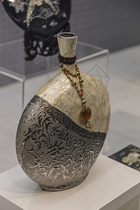 桂花酒圆瓶大连贝壳博物馆贝壳镶嵌圆瓶背景