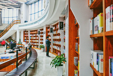环形楼梯简约风网红书店环形书架背景