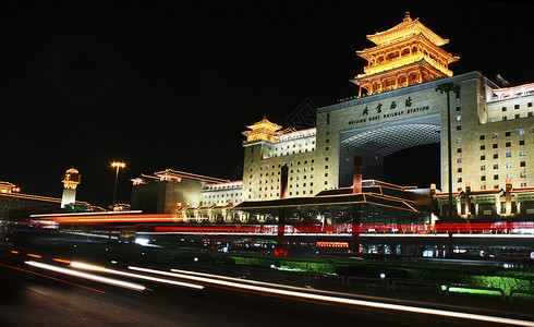 火车站夜幕夜幕下的北京西站背景