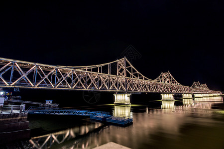 钢索桥丹东鸭绿江大桥夜景背景