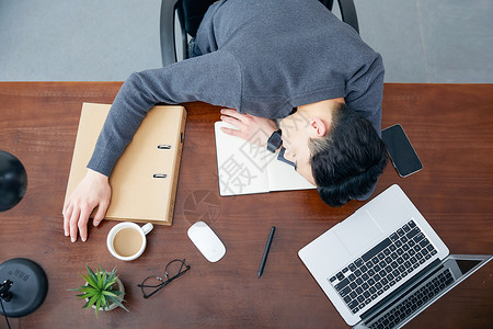 工作瞌睡年轻男性办公室休息背景