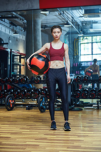 在健身房健身的女性背景图片